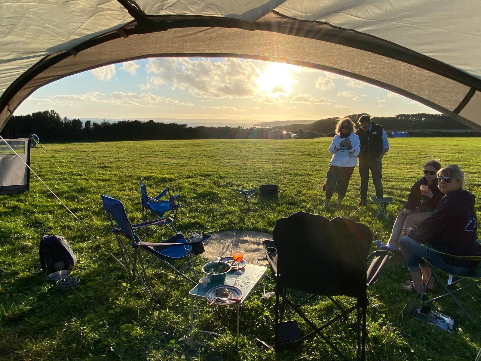 Golden hour light through a tent porch